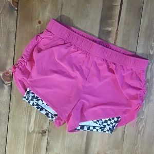 Pink performances wear shorts
